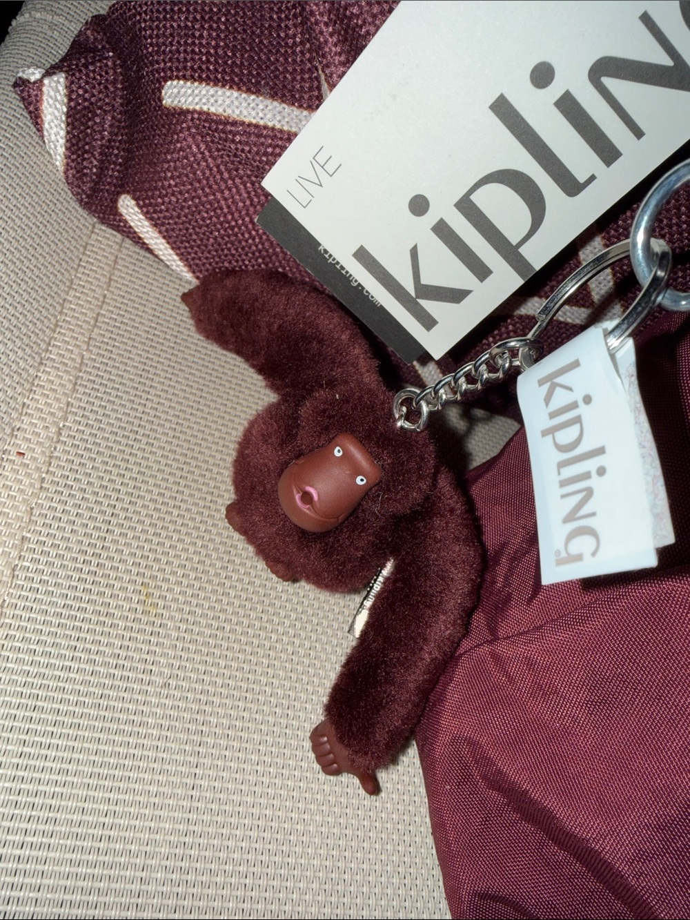 Kipling Wine/Burgundy Crossbody Bag with Their Signature Monkey Charm!